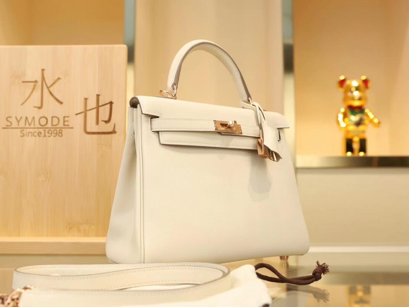 爱马仕包包官网 Hermes Kelly25CM 奶昔白CC10 Swift小牛皮玫瑰金扣凯莉包