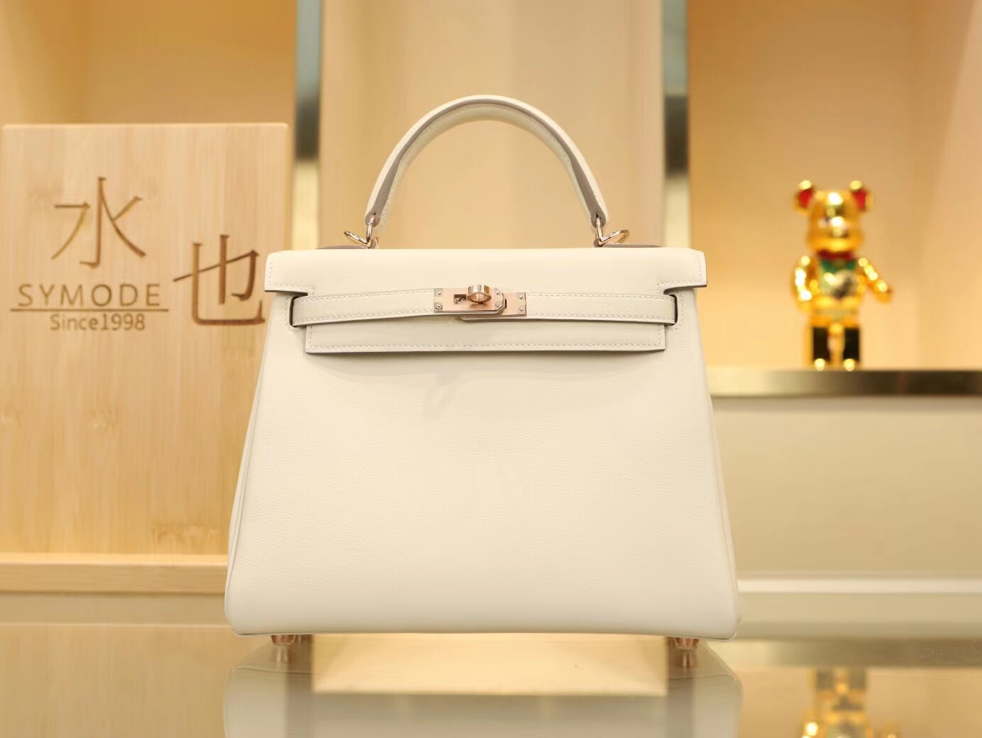 爱马仕包包官网 Hermes Kelly25CM 奶昔白CC10 Swift小牛皮玫瑰金扣凯莉包