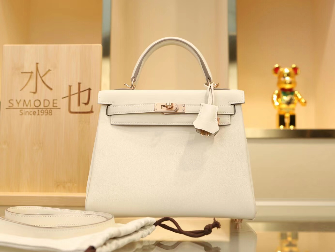 爱马仕包包官网 Hermes Kelly25CM 奶昔白CC10 Swift小牛皮玫瑰金扣凯莉包