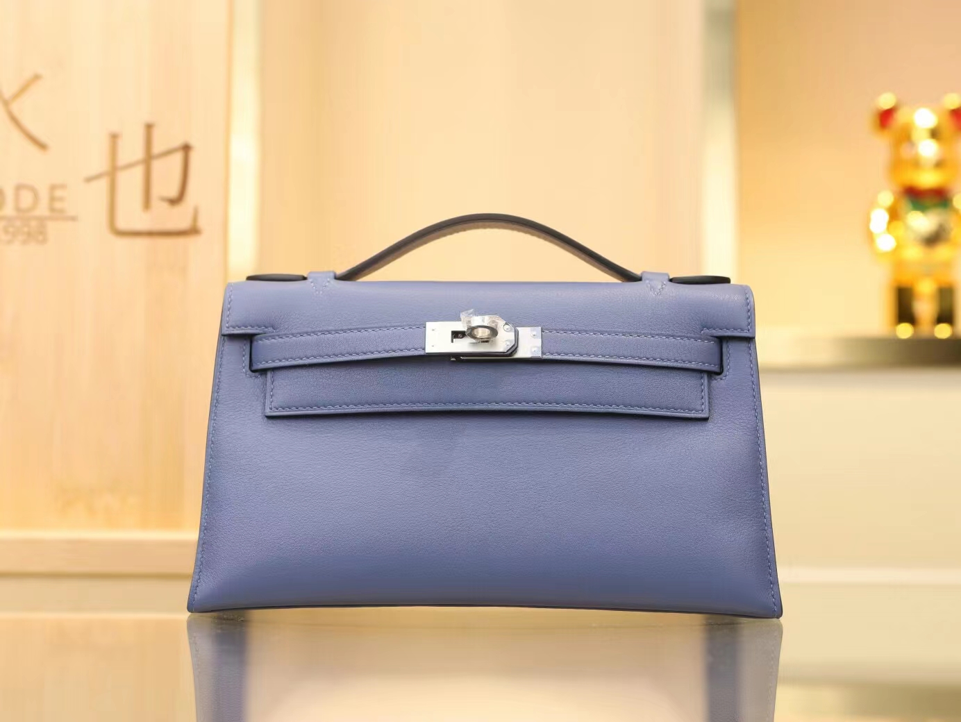 水也名品Hermes Mini Kelly Pochette22cm 7E明蓝色Swift牛皮手拿包 银扣