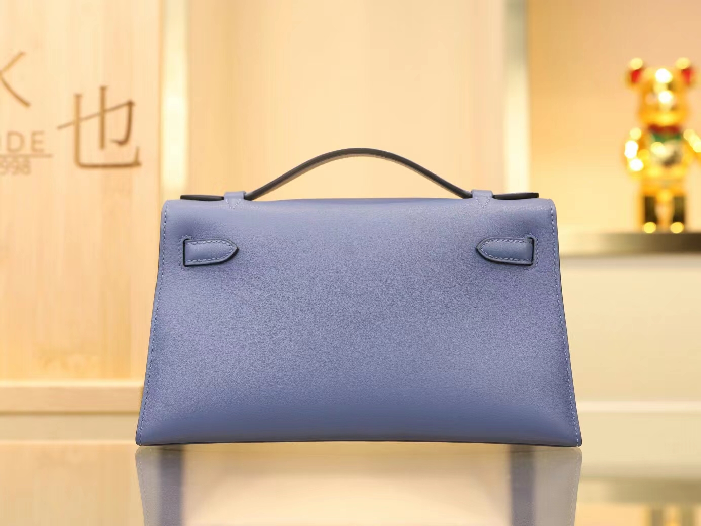 水也名品Hermes Mini Kelly Pochette22cm 7E明蓝色Swift牛皮手拿包 银扣